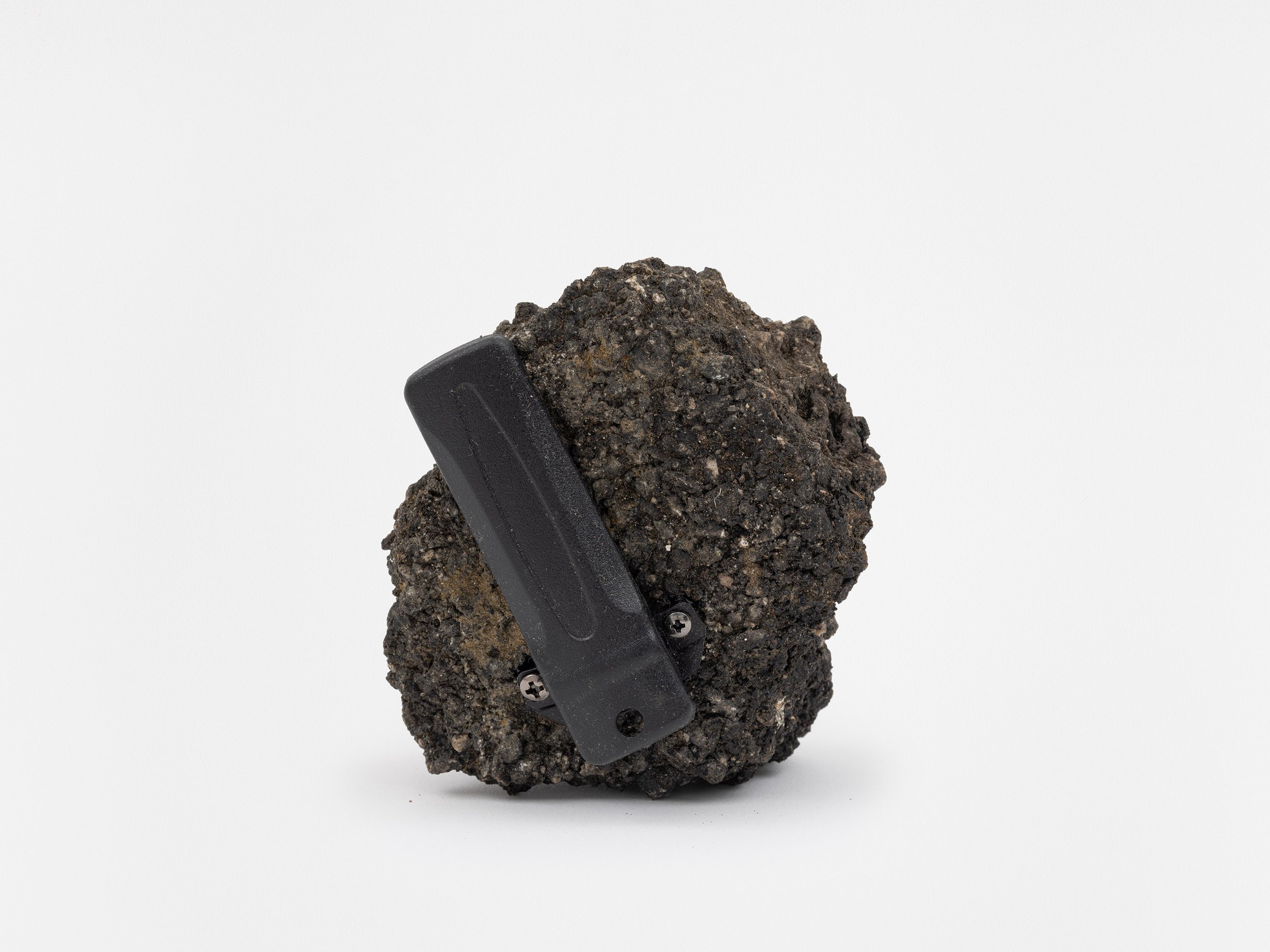   Cell Device (Pager): 7932 Mulholland Drive, Los Angeles, California    2024   concrete, pager belt clip, and screws  3 ½ x 2 ½ x 2 ¼ inches   Smart Objects, 2024   Exhibition:  Profit &amp; Loss, 2024  