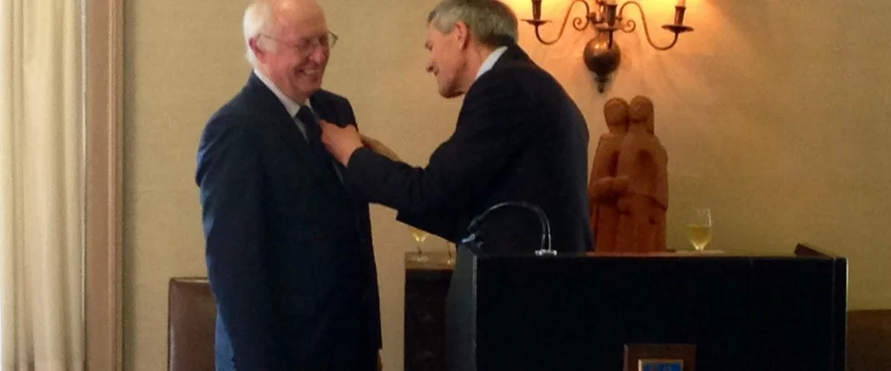Director John English receives German Order of Merit