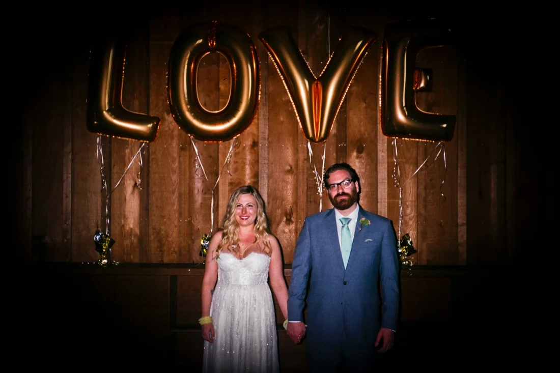 holly's wedding; negative scans 15; dave holly gold love balloons.jpg