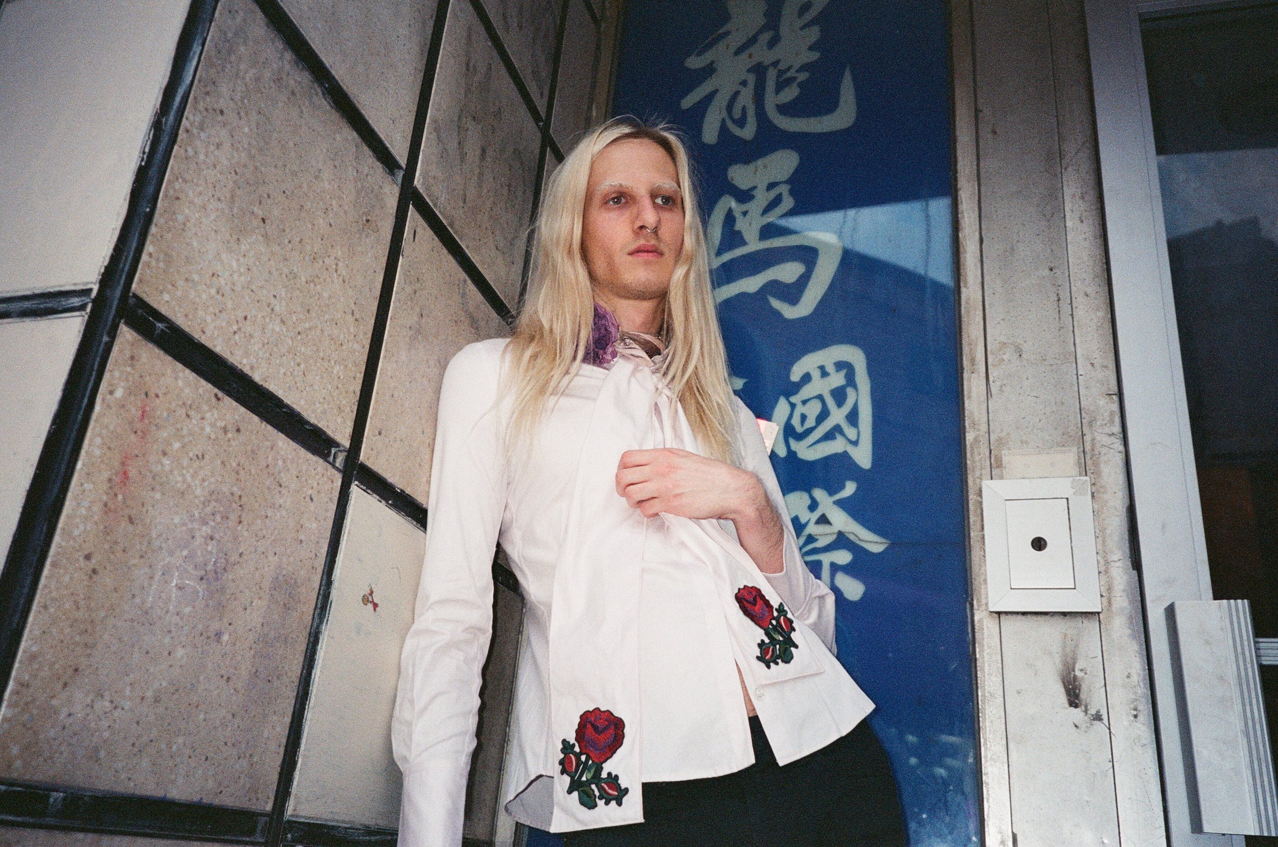 Top by Gucci and trousers by Acne .