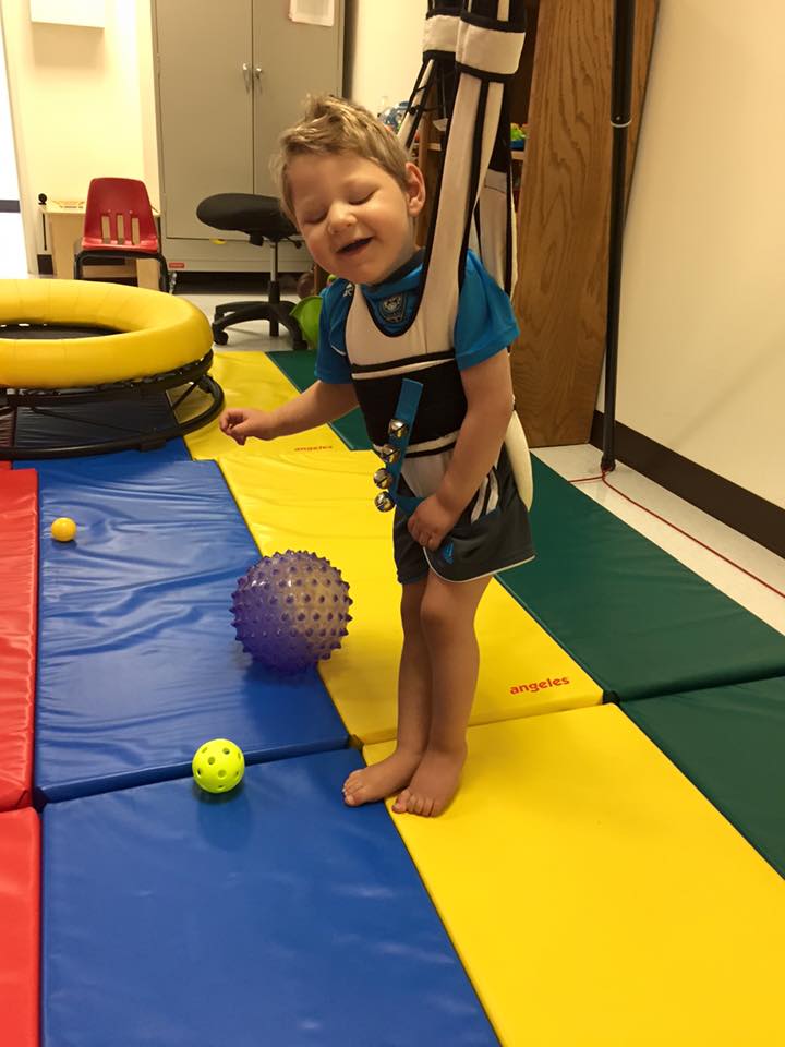  Calin having fun in physical therapy. 