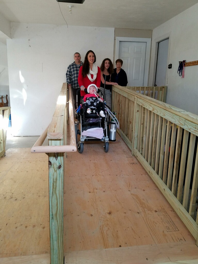 Leila, her family and a finished ramp!