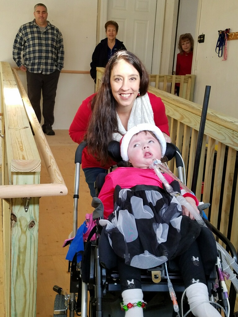 Leila and her mom pose on her new ramp!