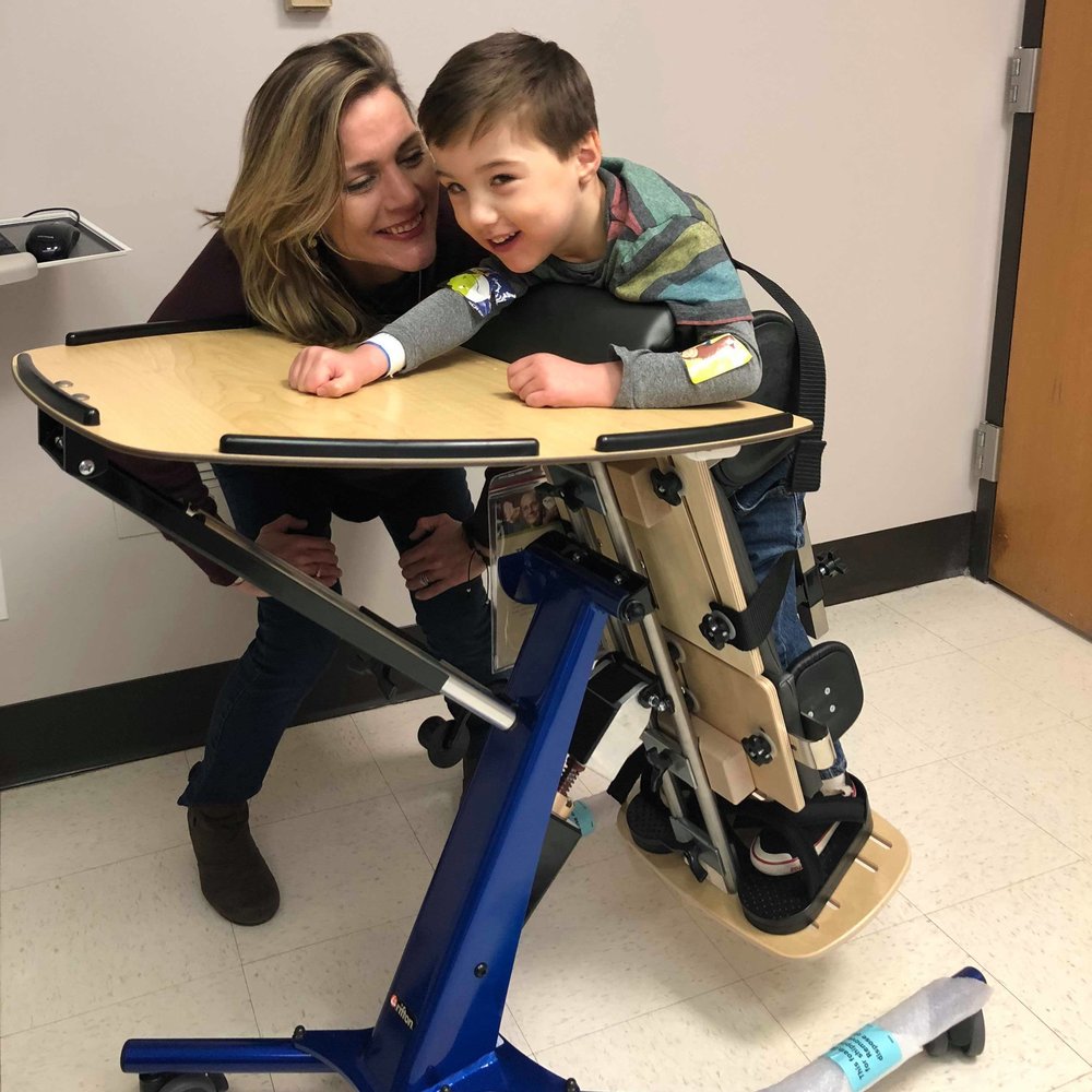  Webb in his new stander with mom. 
