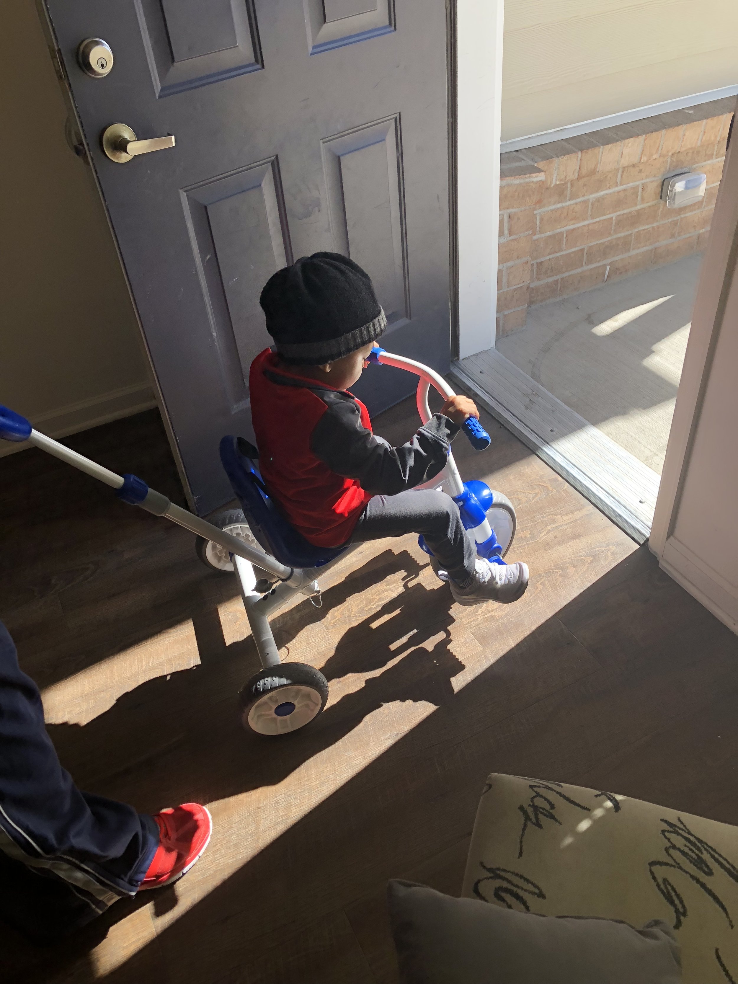  Time for an afternoon cruise on his new tricycle. 