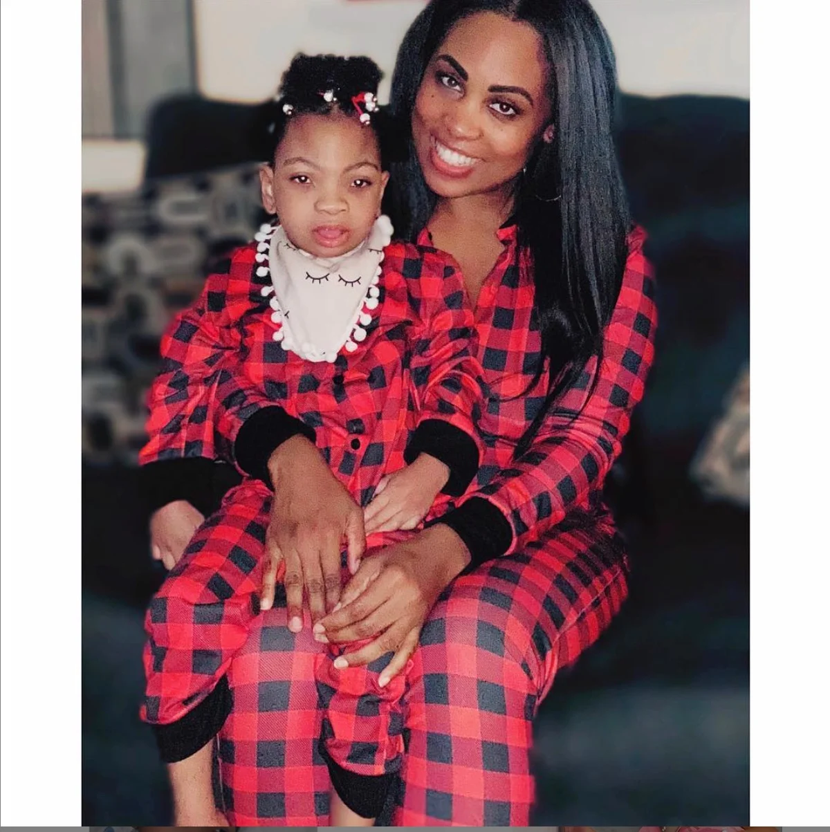 Christi Jo is picture perfect in her mother’s arms at home in Los Angeles, CA on Christmas Eve.