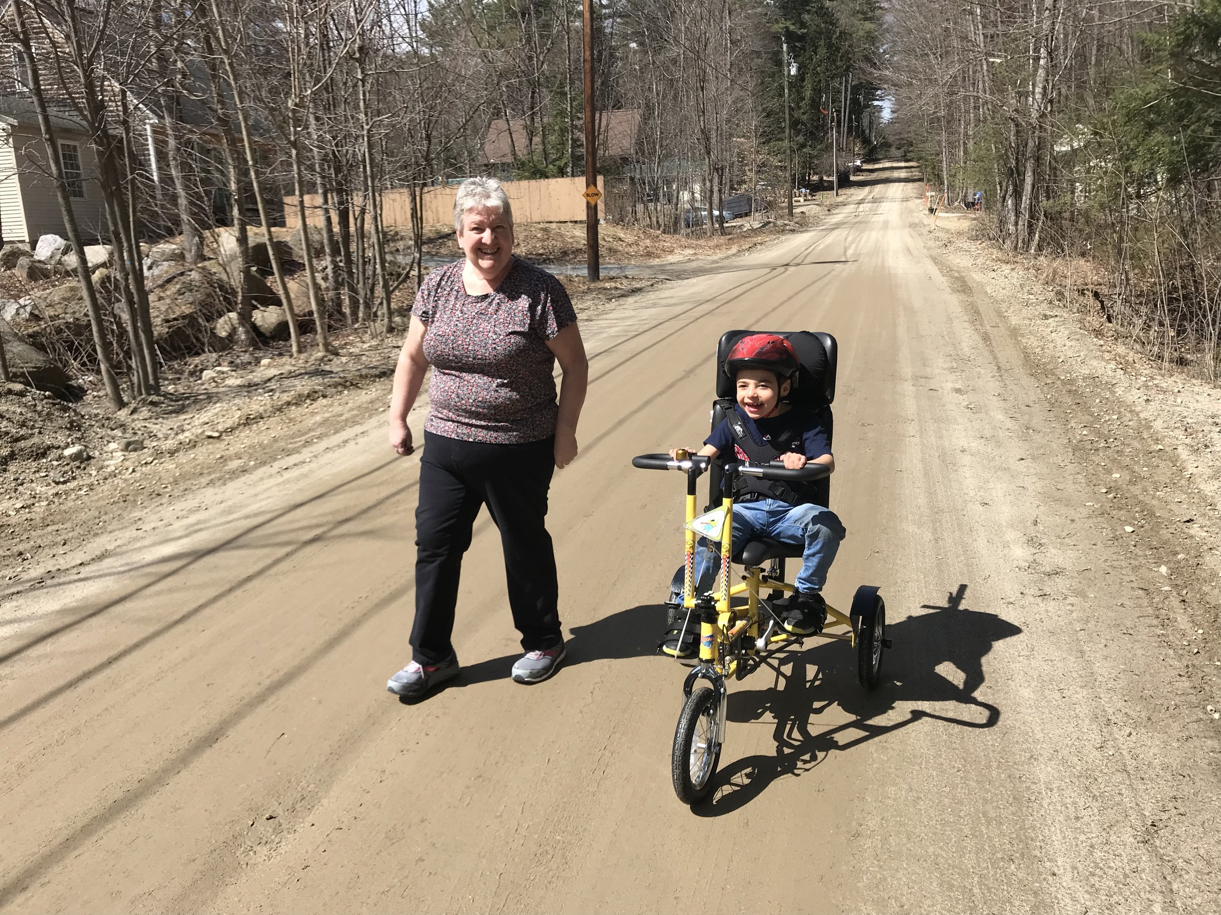 Noah speeds down a road near his home!