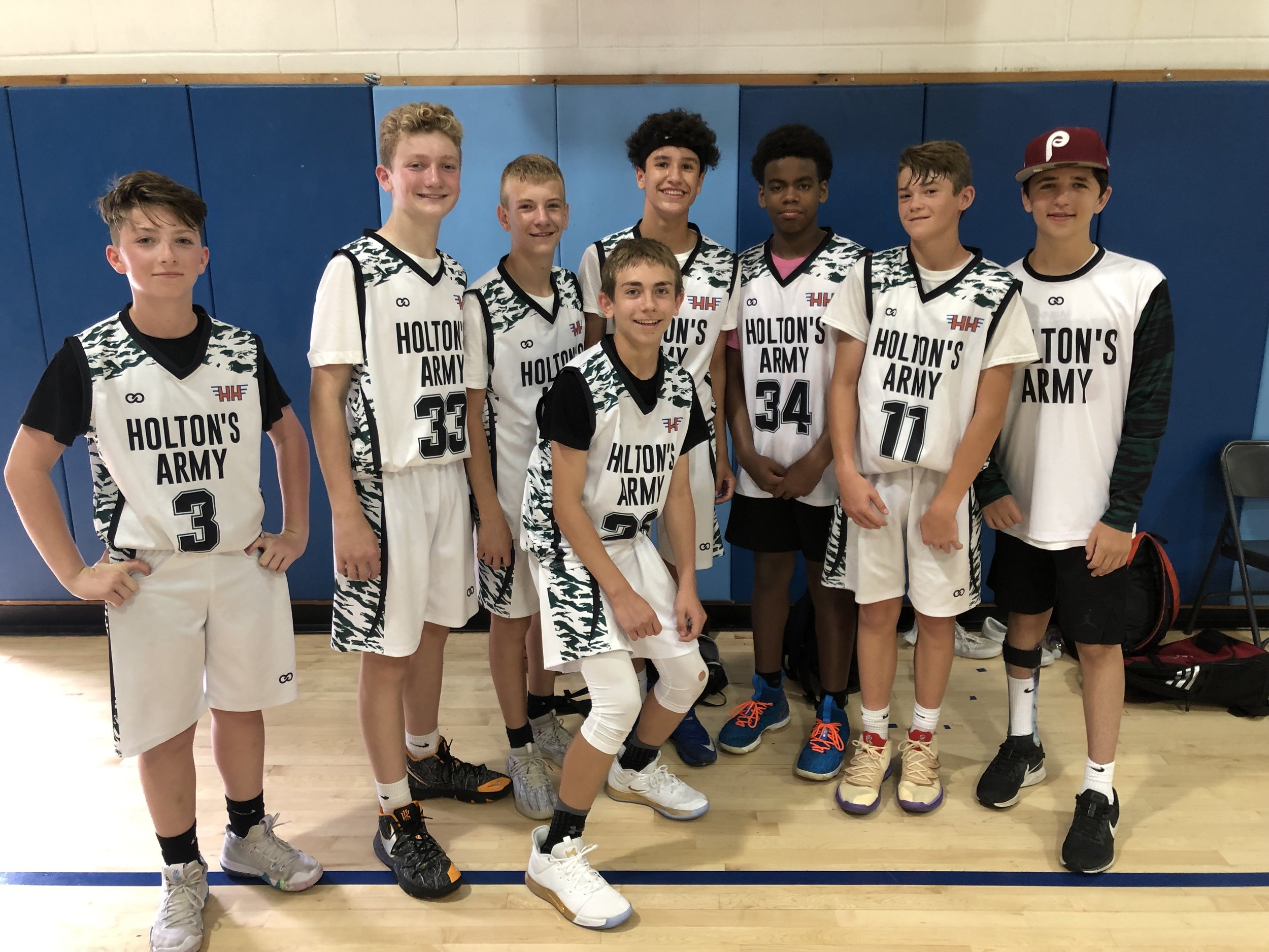 Chase and the Holton’s Army tournament basketball team sponsored by Holton’s Heroes.