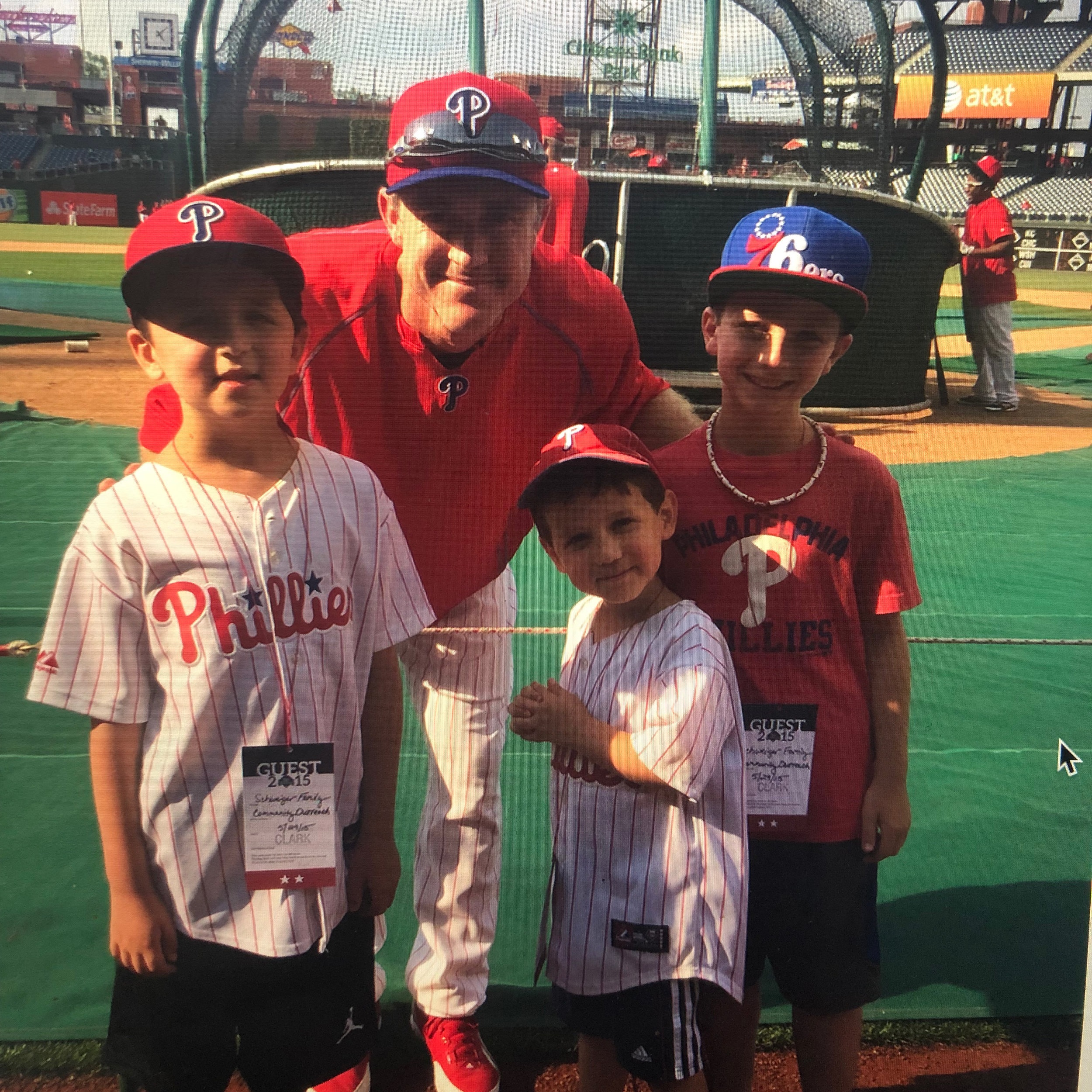  Chase, Sam, and Chase’s younger brother Mason pose for a photo with Philadelphia Phillies great Chase Utley. 