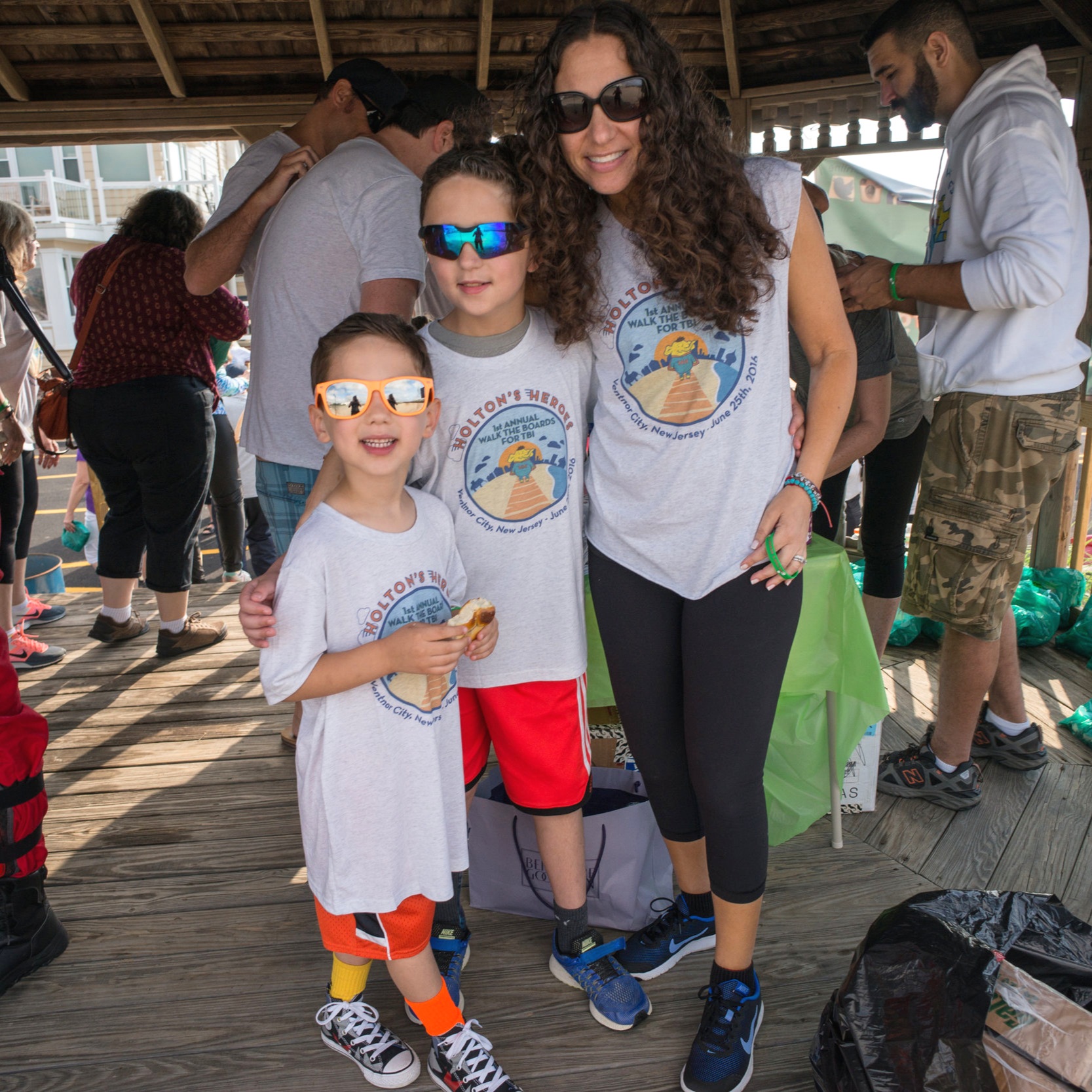  Chase (middle) poses with his mom Wendi and little brother Mason at the 1st annual Holton’s Heroes charity walk in Ventnor City, NJ in 2016. 