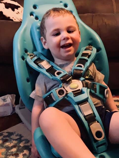 Colton enjoying his new Splashy chair from Holton’s Heroes.