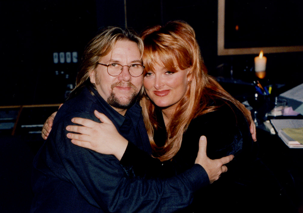 Wynonna Judd and DP hug it out while he produces songs he wrote for her "The Other Side" album