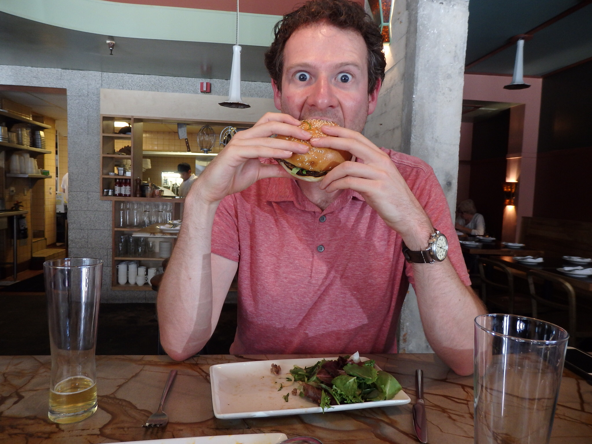  Olly gets his mouth around an Americana - just as Kevin insists. No cutlery! 