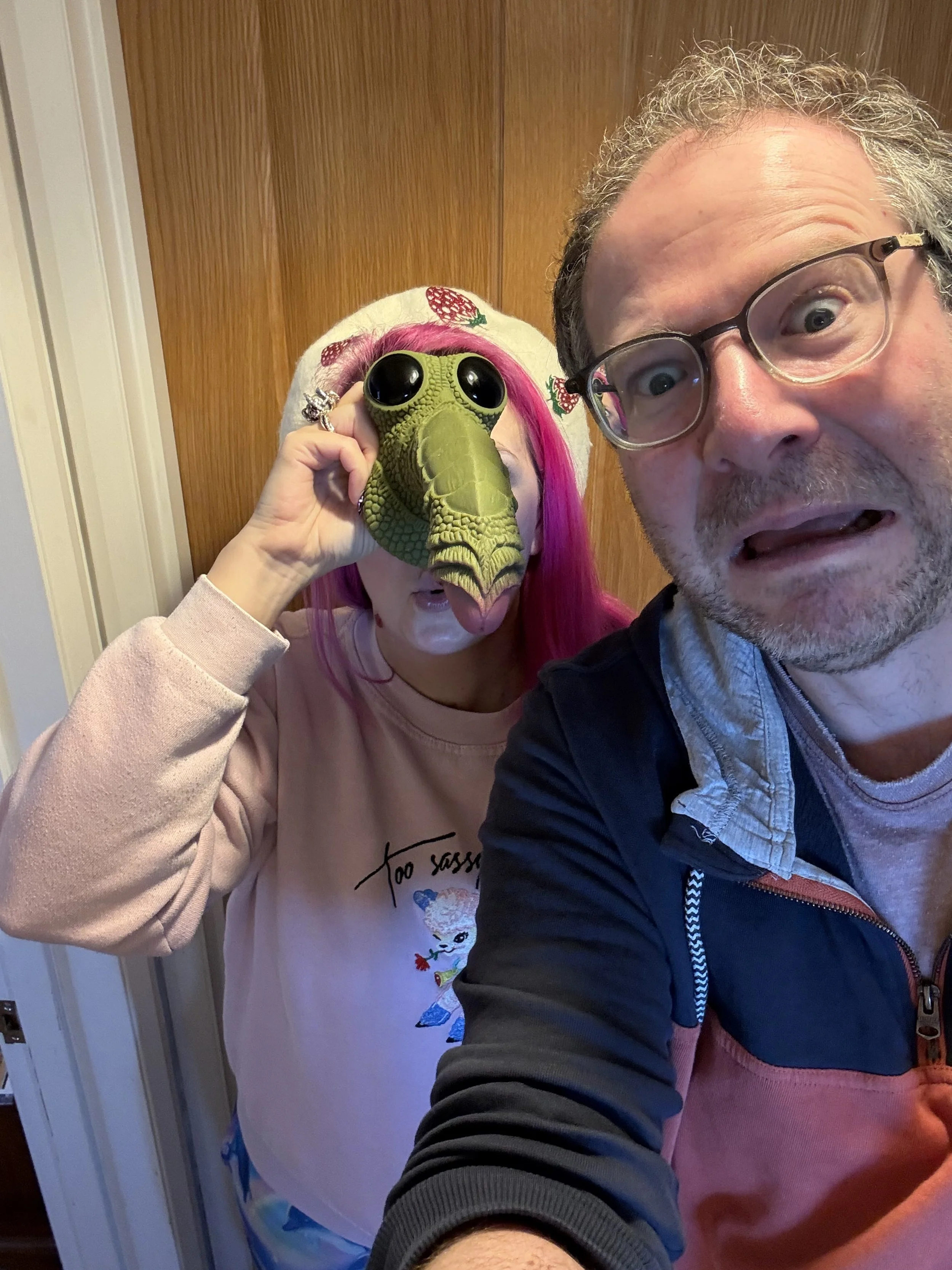   Alix and Olly model a ‘Swamp Monster’ toy  