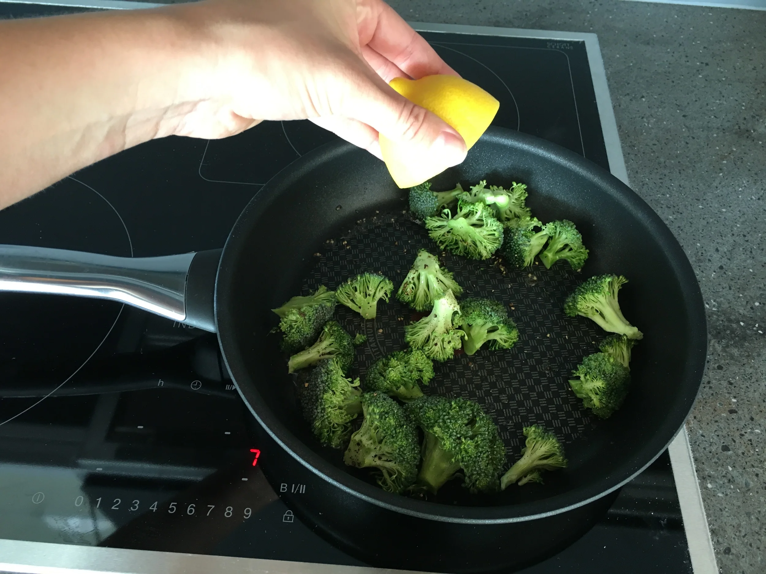 Step 5: Add freshly squeezed lemon and remove pan from heat