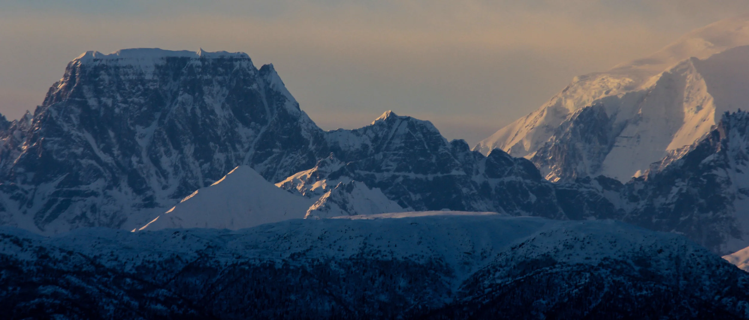 Castle Peak and the edge of Blackburn catching the last of the evening light.