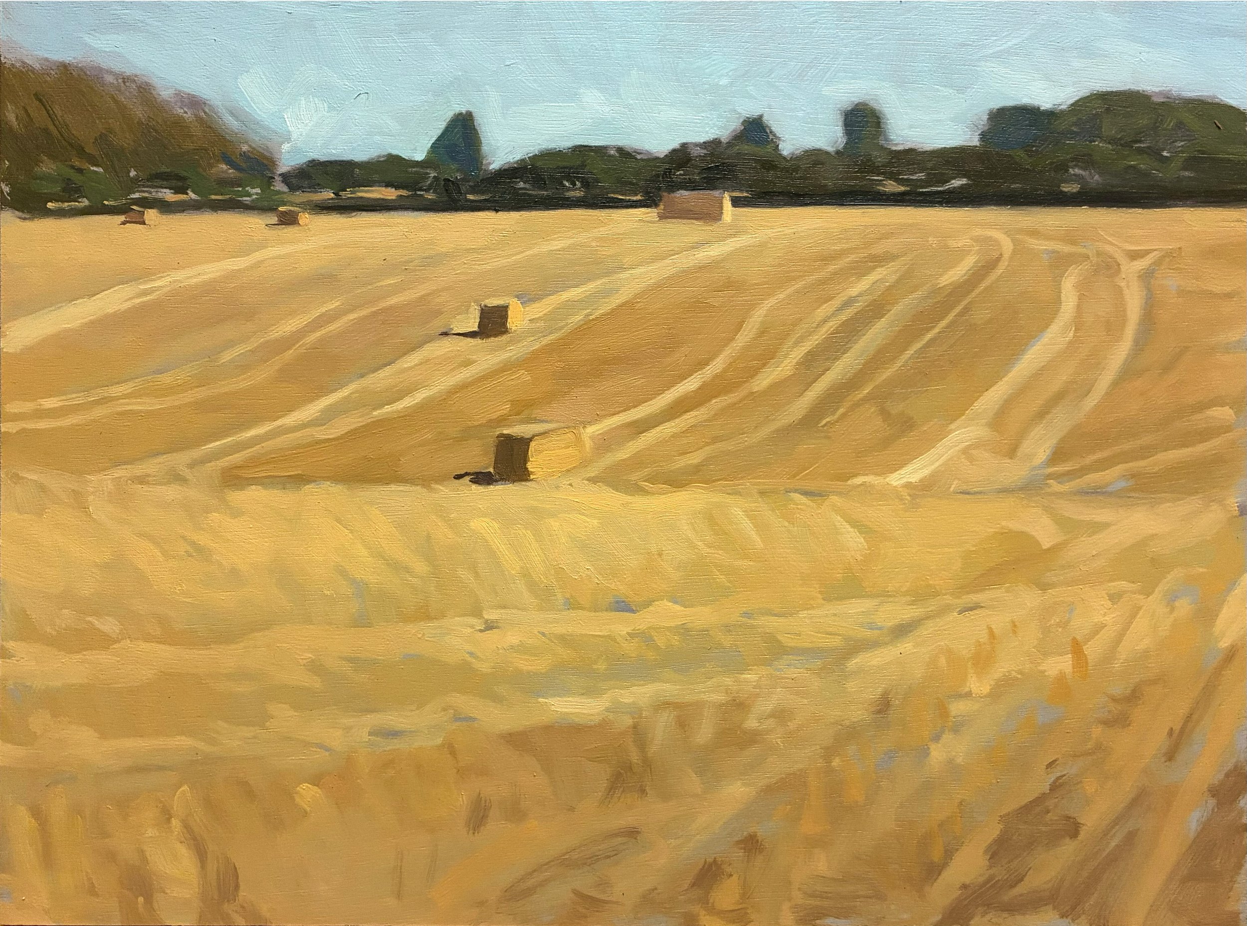 Oil painting of a golden wheat field with hay bales and a line of trees at the horizon under a light blue sky.