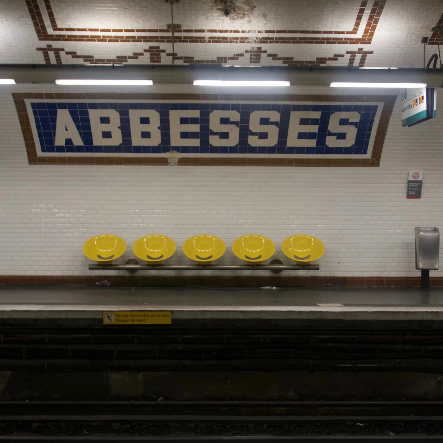 The Paris Metro stations have such cool designs, I LOVE the yellow smiley face chairs.&nbsp;   