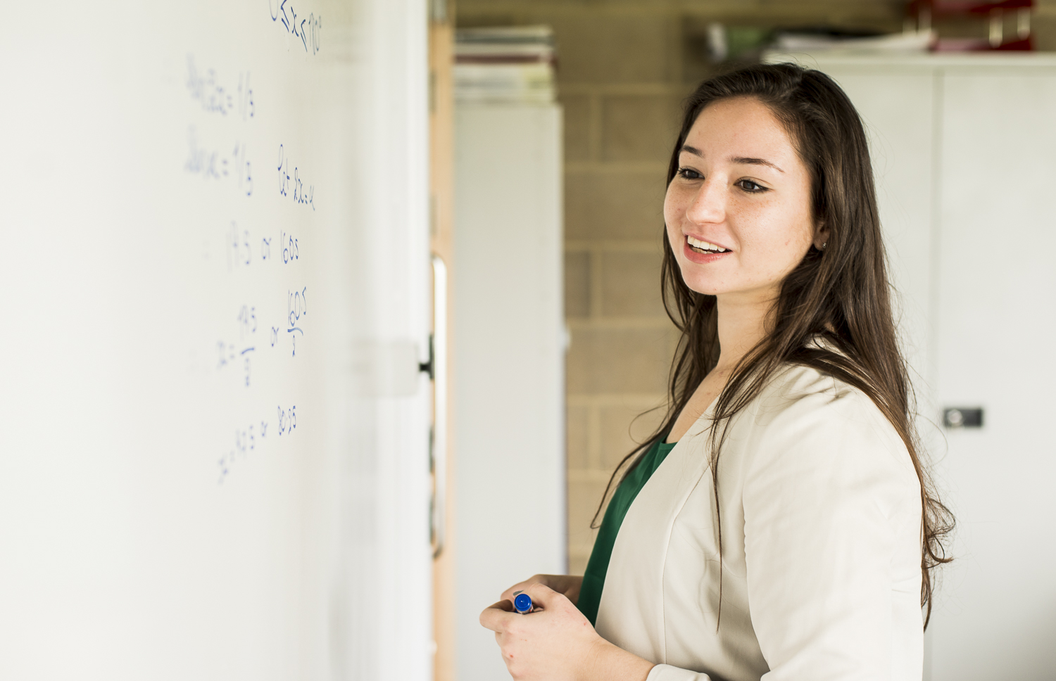Portait of student at whiteboard, Sixth form