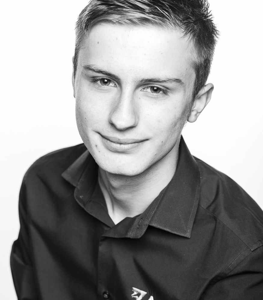 Young business man in shirt, black and white portrait