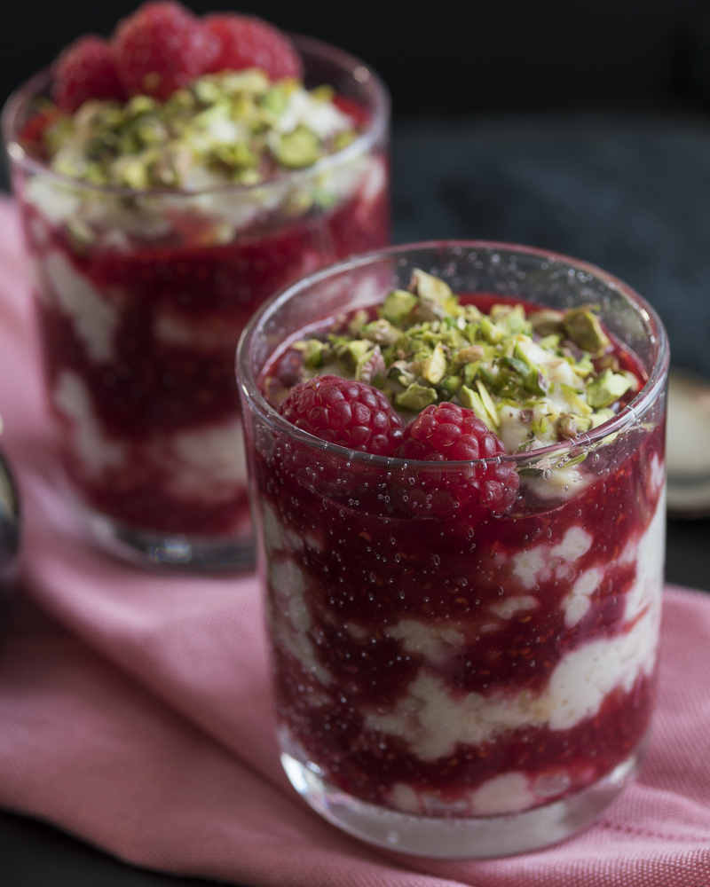 Porridge layered in gals with berry coulis