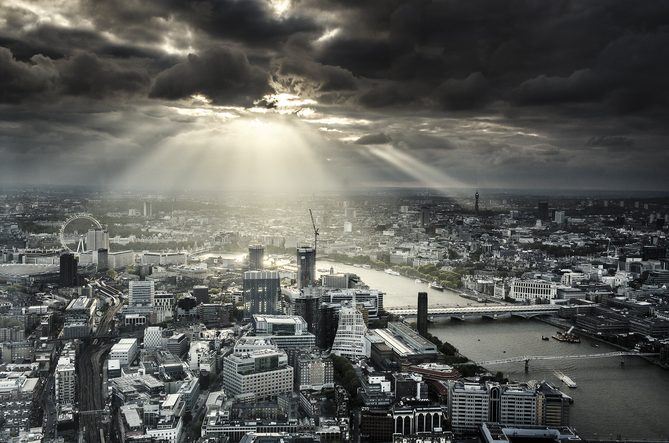 Award winning image, aerial view of London with the sun breaking through the clouds