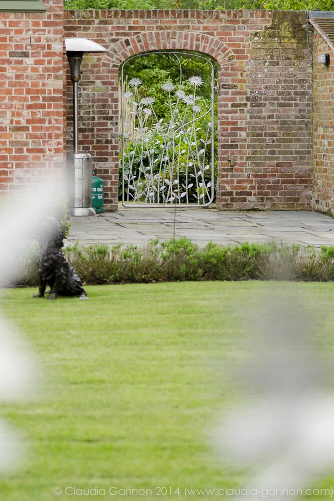 Gate in the wall, gate to walled garden, beautiful gate for walled garden