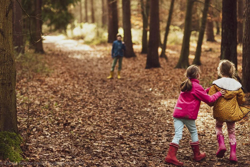 Friends playing in the woods