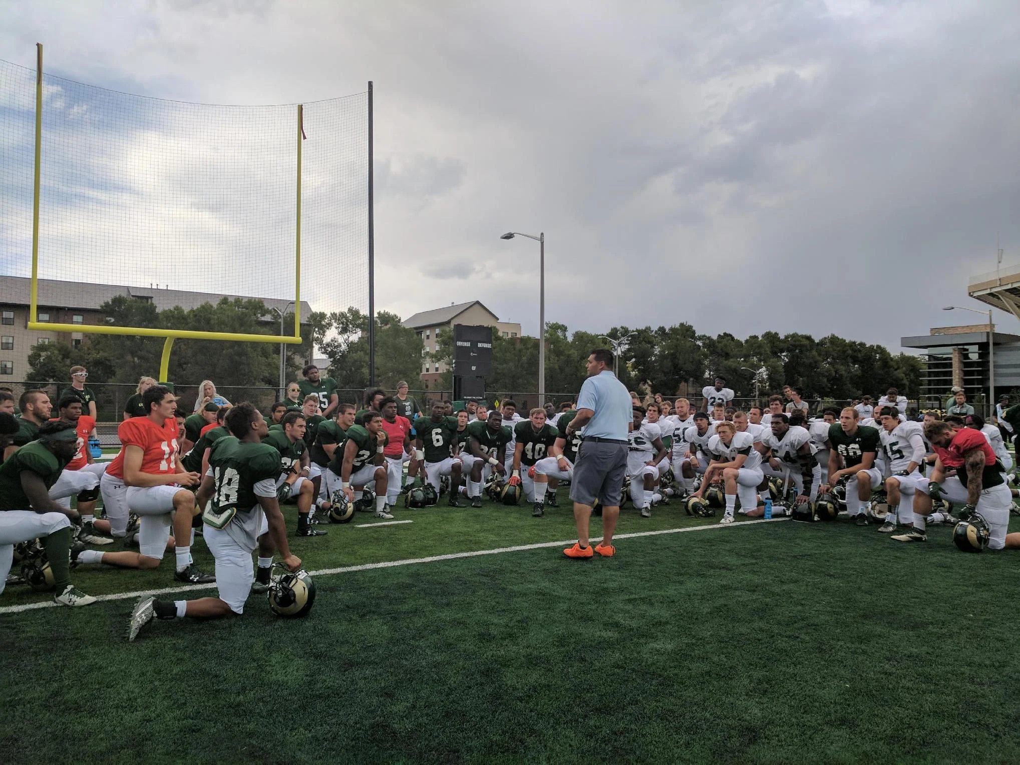 Reza speaking to CSU Football.jpg