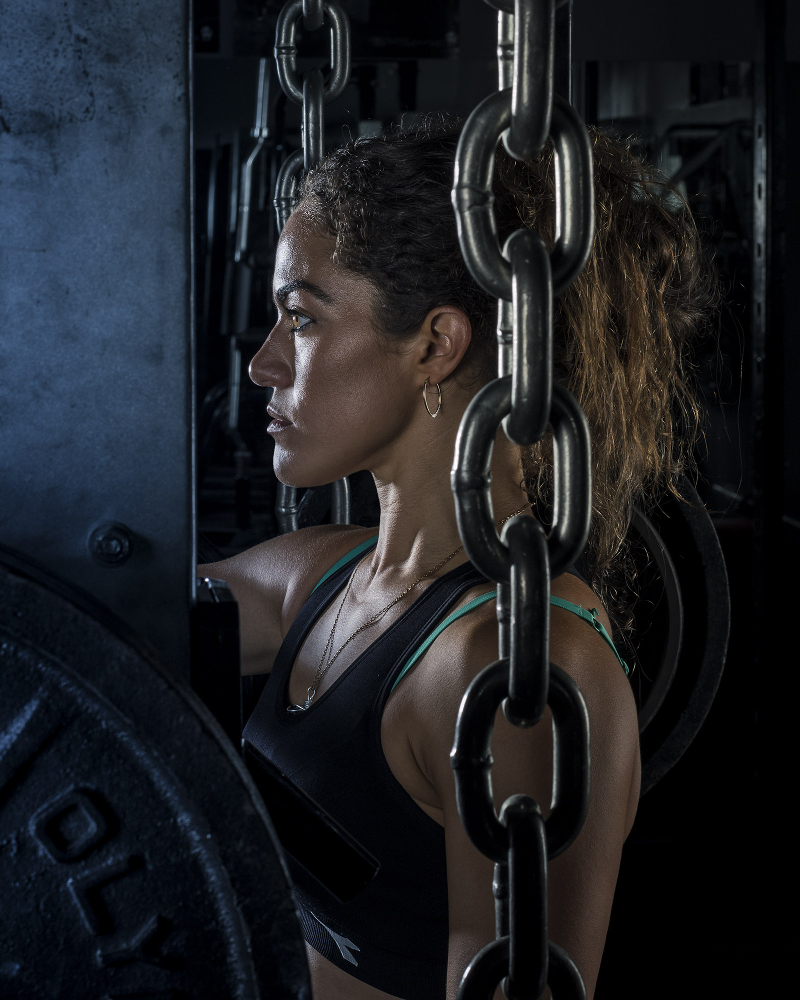 I wanted to show the iron dedication the model has for working out and fitness so we needed an intense image.