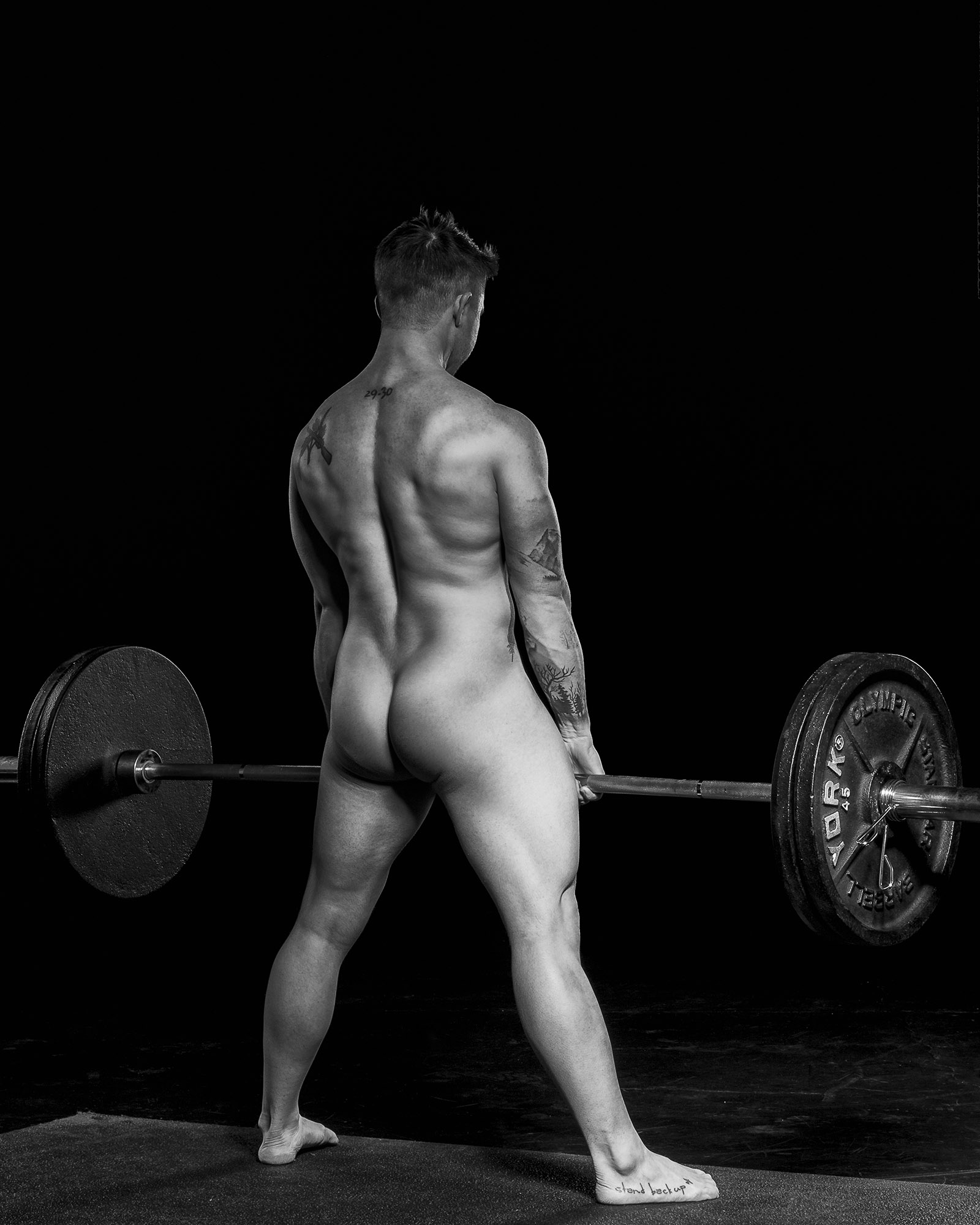 Nude weight lifters