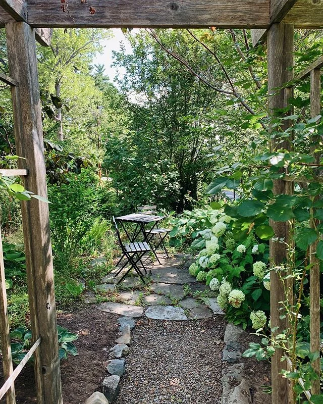 We cleaned up this little courtyard nook and took it from overgrown and crowded to cozy and comfortable. Don&rsquo;t you just want to hang out with a cup of coffee and a good book? ☕️ &bull;
&bull;
&bull;
&bull;
&bull;
#thesheshed #thesheshedhalifax 