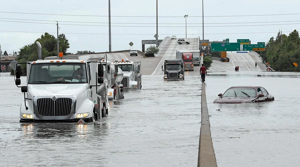 harvey-hurricane-flood-trucks-highway.jpg