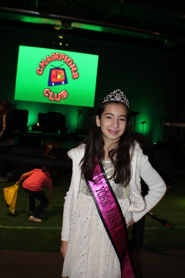 Kristina Paravalos stepping out in her Miss Amazing gear at the Christ Tabernacle Easter Eggstravaganza! She had a great time greeting the kids, participating in the egg hunt, as well as enjoying a bounce house, prizes and endless popcorn!