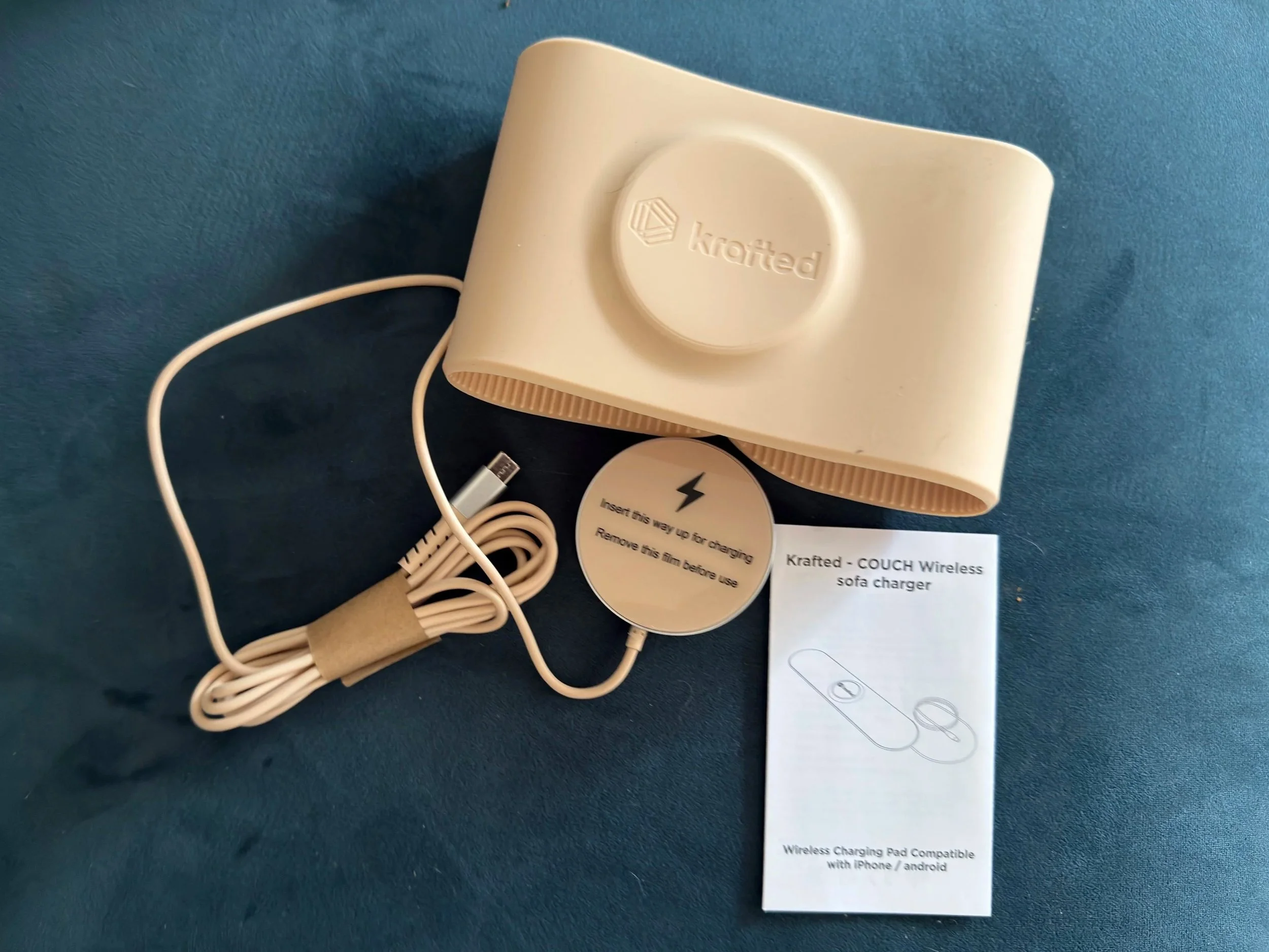 Krafted Couch wireless sofa charger packaging showing flexible armrest charging pad for iPhone and Android devices
