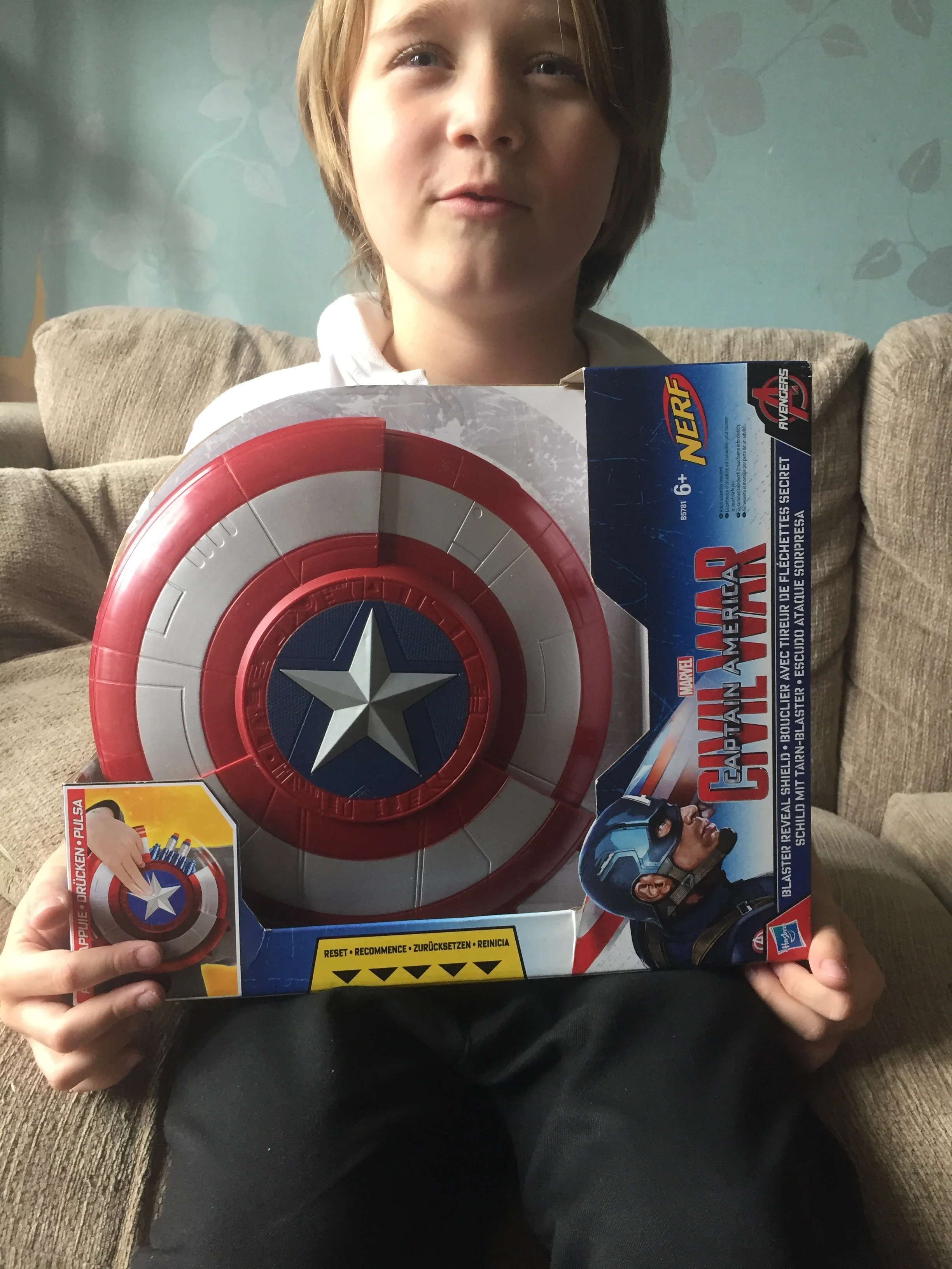 Jacob is a massive NERF Gun fan, he saves his pocket money to buy all the latest ones, and with, well over 30 different NERF toys of all shapes and sizes he has a pretty awesome collection! He is also a massive Marvel fan, Hawkeye and Captian America being his two favourite characters, so when we were offered to review the Civil War Blaster Reveal Shield he was super excited. Although I should note that this is not a NERF gun, however, it is designed to shoot the NERF bullets. 