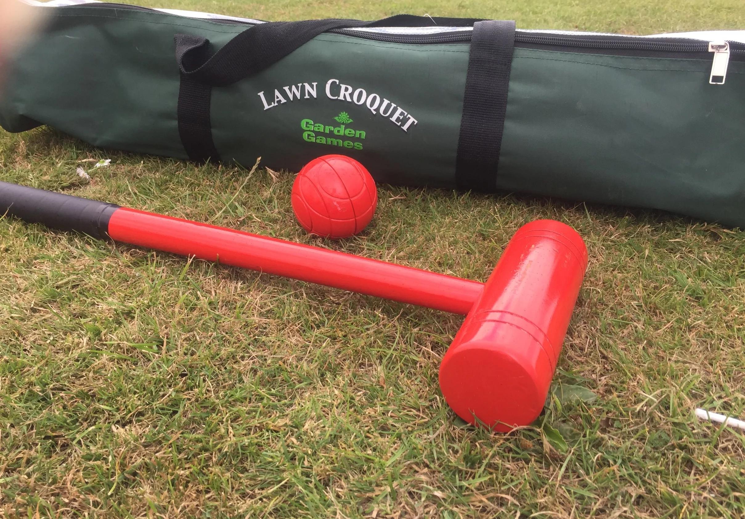 I love introducing new games to the children, especially games that can be played outdoors. And, Lawn Croquet is a classic and traditional game, one that the kids haven't played before. So I was super excited when were sent Garden Games Lawn Croquet set to review. Lawn Croquet is a simple but fun game.