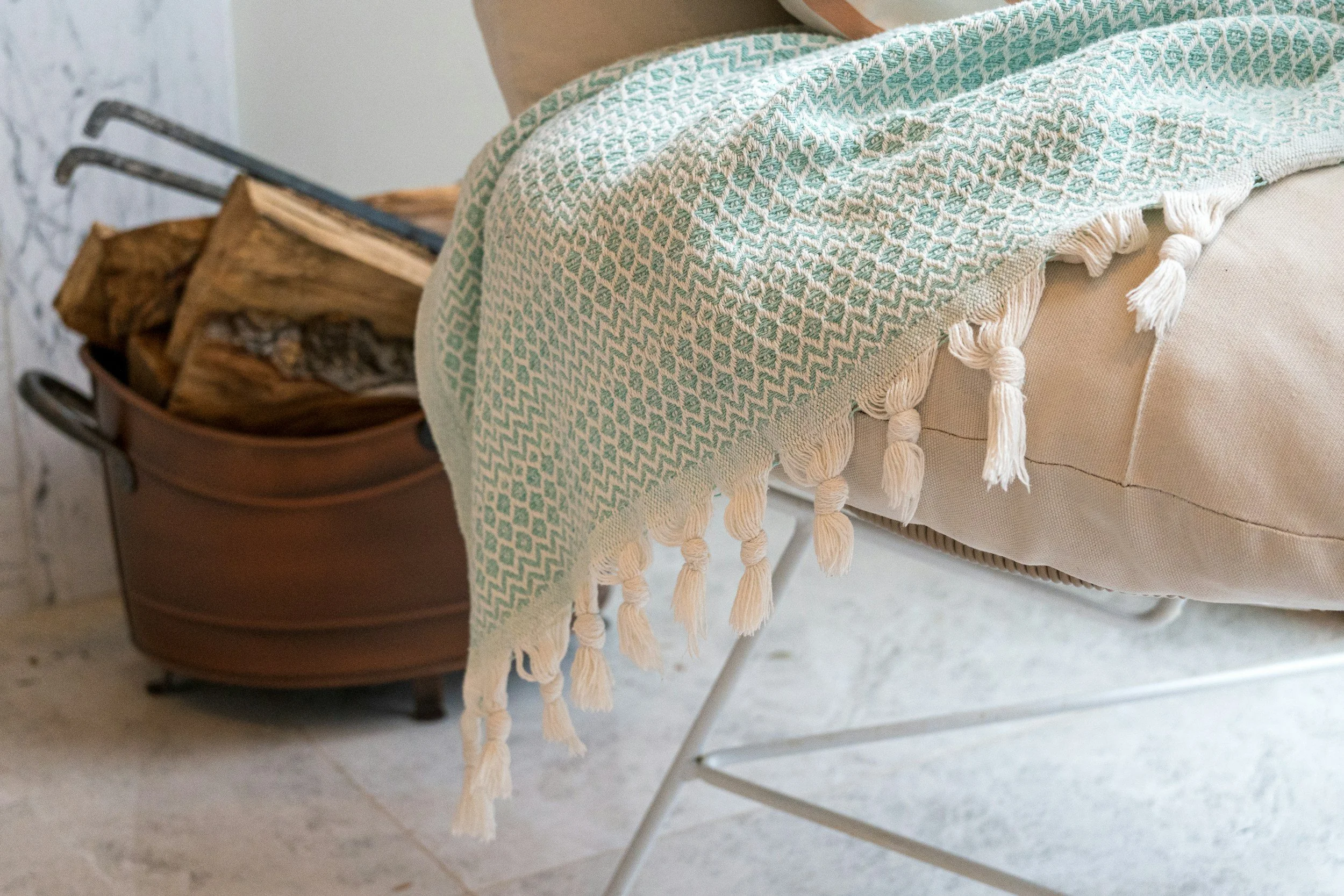 Blanket draped over a chair