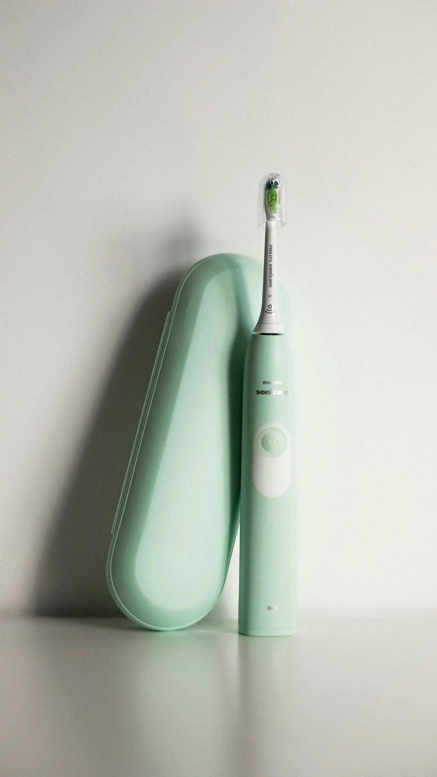 Electric toothbrush in bathroom supporting low effort hygiene for people with ME CFS and fibromyalgia