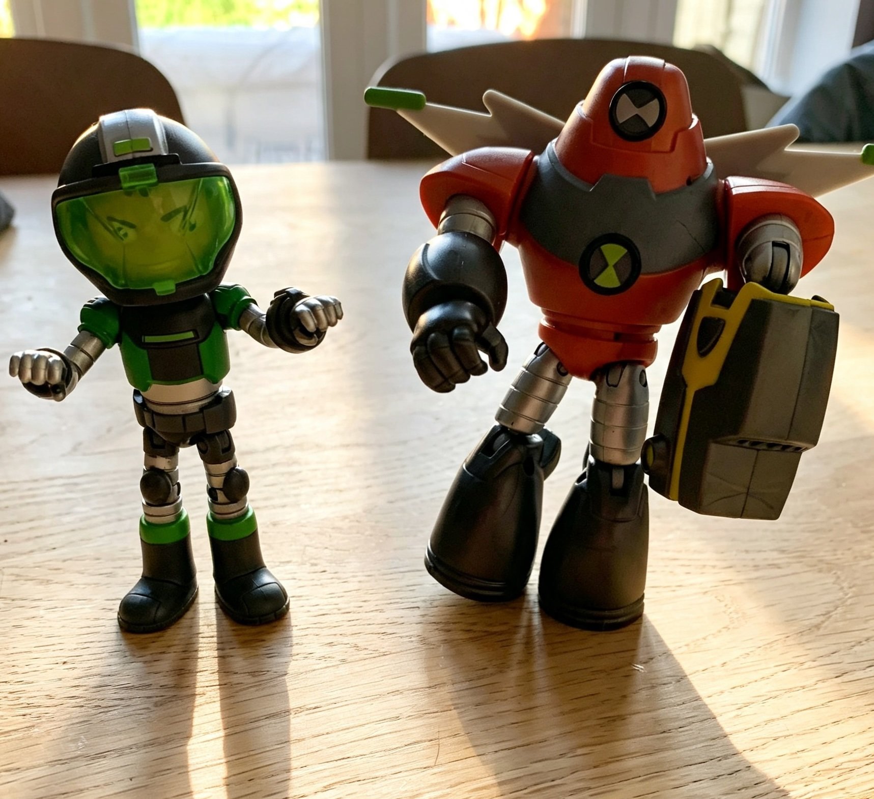 Ben 10 Omnitrix and Omni-Naut Armor toy figures displayed on wooden table, kids toy review detail photo, crackednailsandsplitends.co.uk