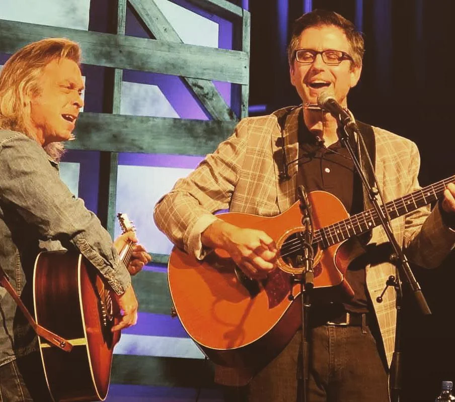 Jim Lauderdale on stage with Todd Burge