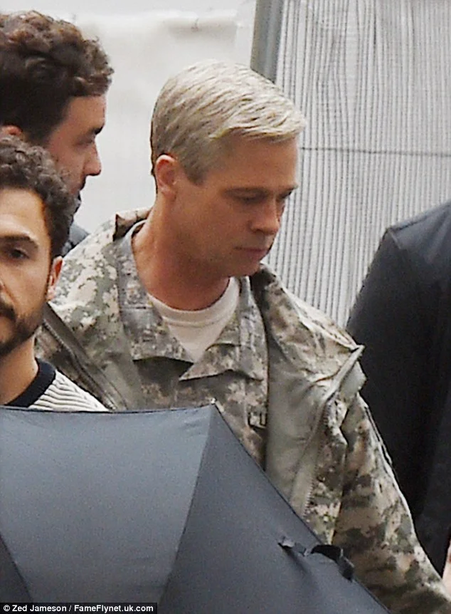 Brad Pitt debuts grey hairdo on set of satirical comedy War Machine