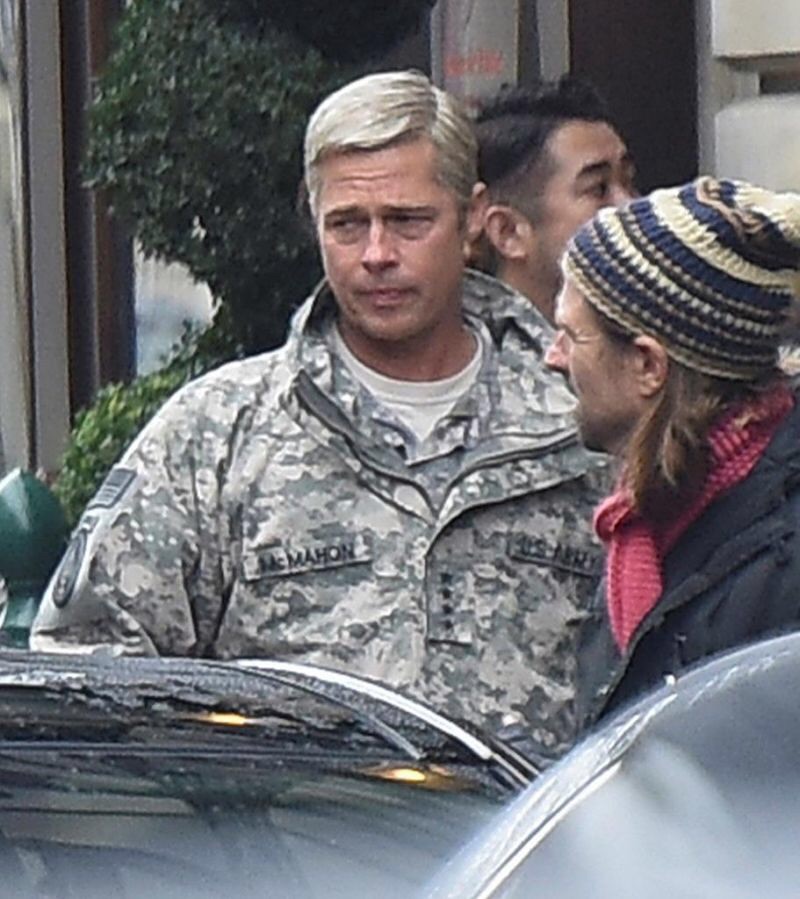 Brad Pitt and Ausralian filmmaker David Michôd discussing the scene; on set in London during the production of the Netflix original film 'War Machine , September, 2015. The film will be released in theatres and on Netflix this fall, 2016. 