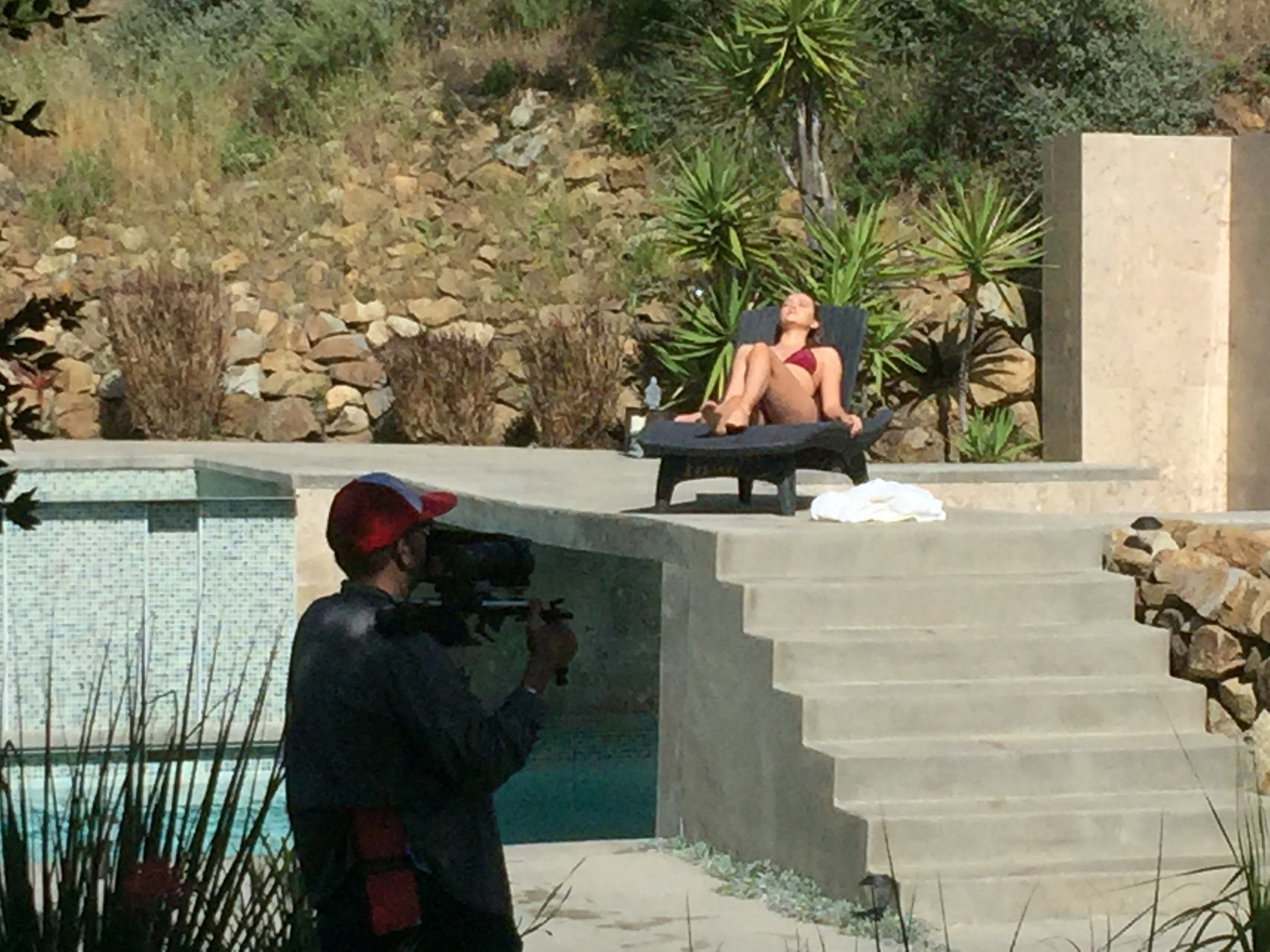 Director Carl Bessai and actress Ivy Matheson shooting a scene on the set of 'The Lears', April 24, 2015 in Malibu, California.