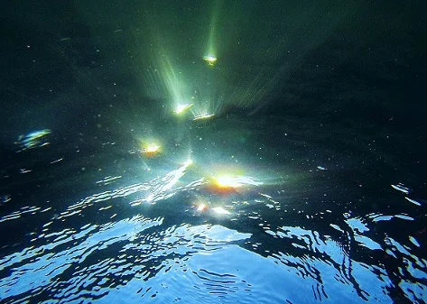 Sparkling Rays, by the author In this photo I show how two important elements--water and sun-- mix together to create beautiful sparkling rays of different colors.