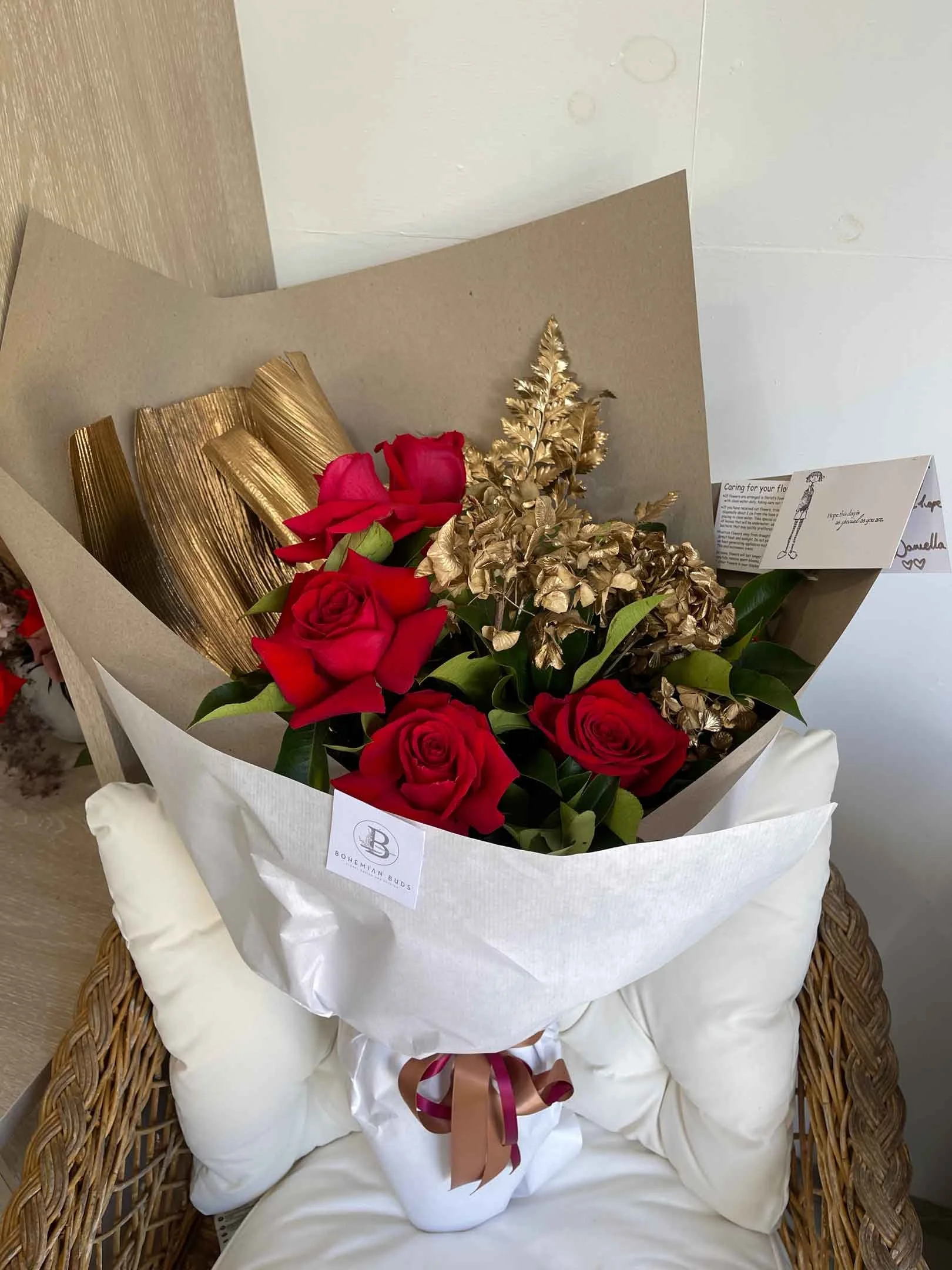 Red roses with gold features - hills district florist