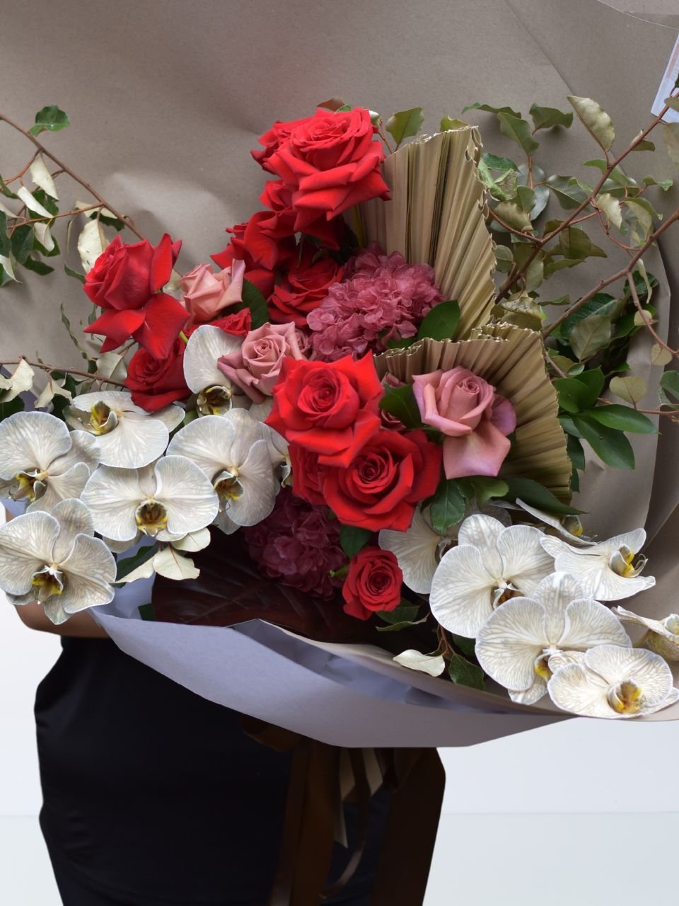 Large valentines day bouquet, red roses, orchids. Hills district florist