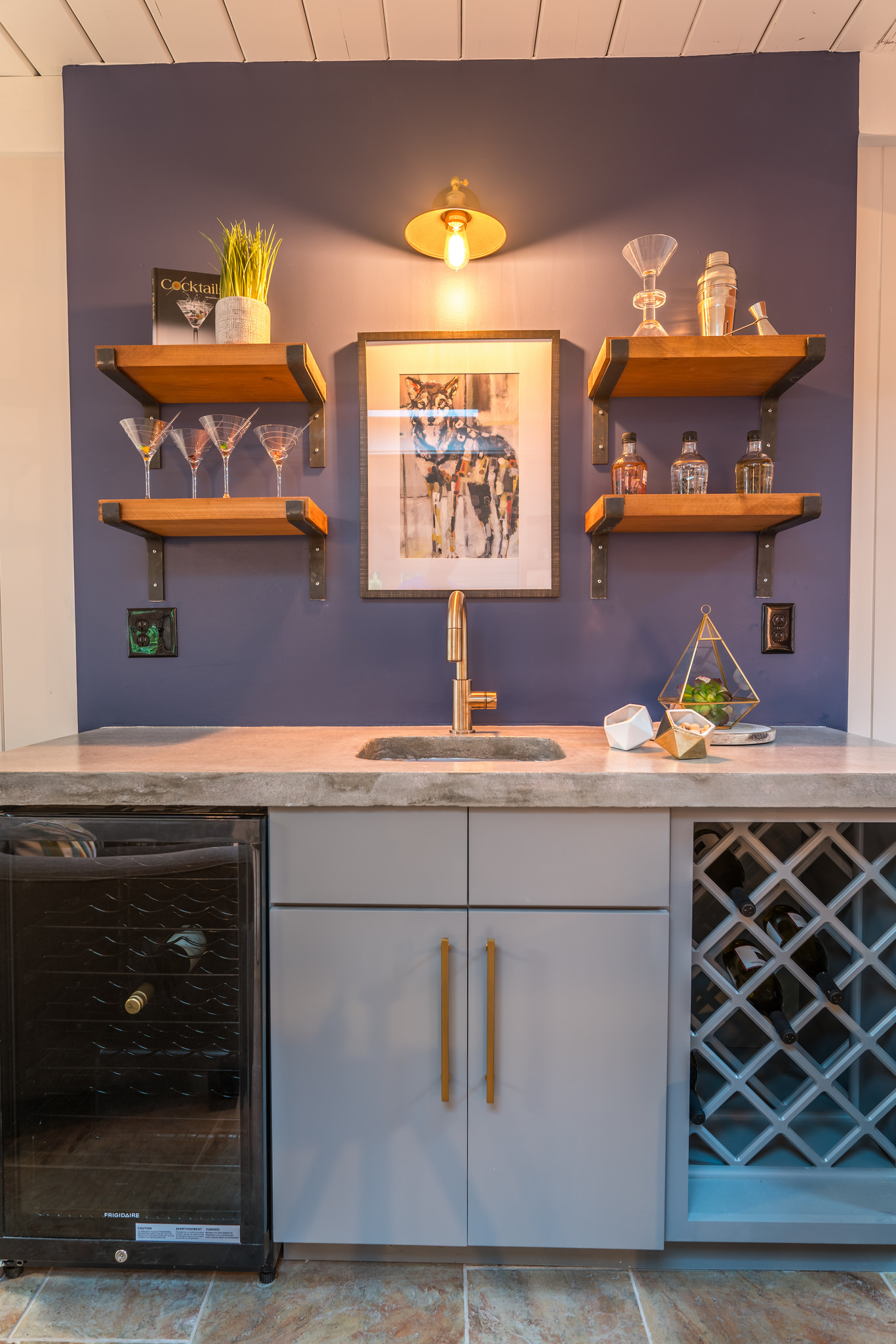 Custom wet bar with beverage fridge and wine rack