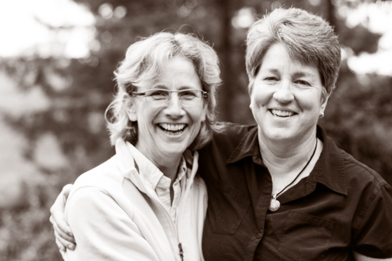  Close up of couple hugging, smiling and laughing. 