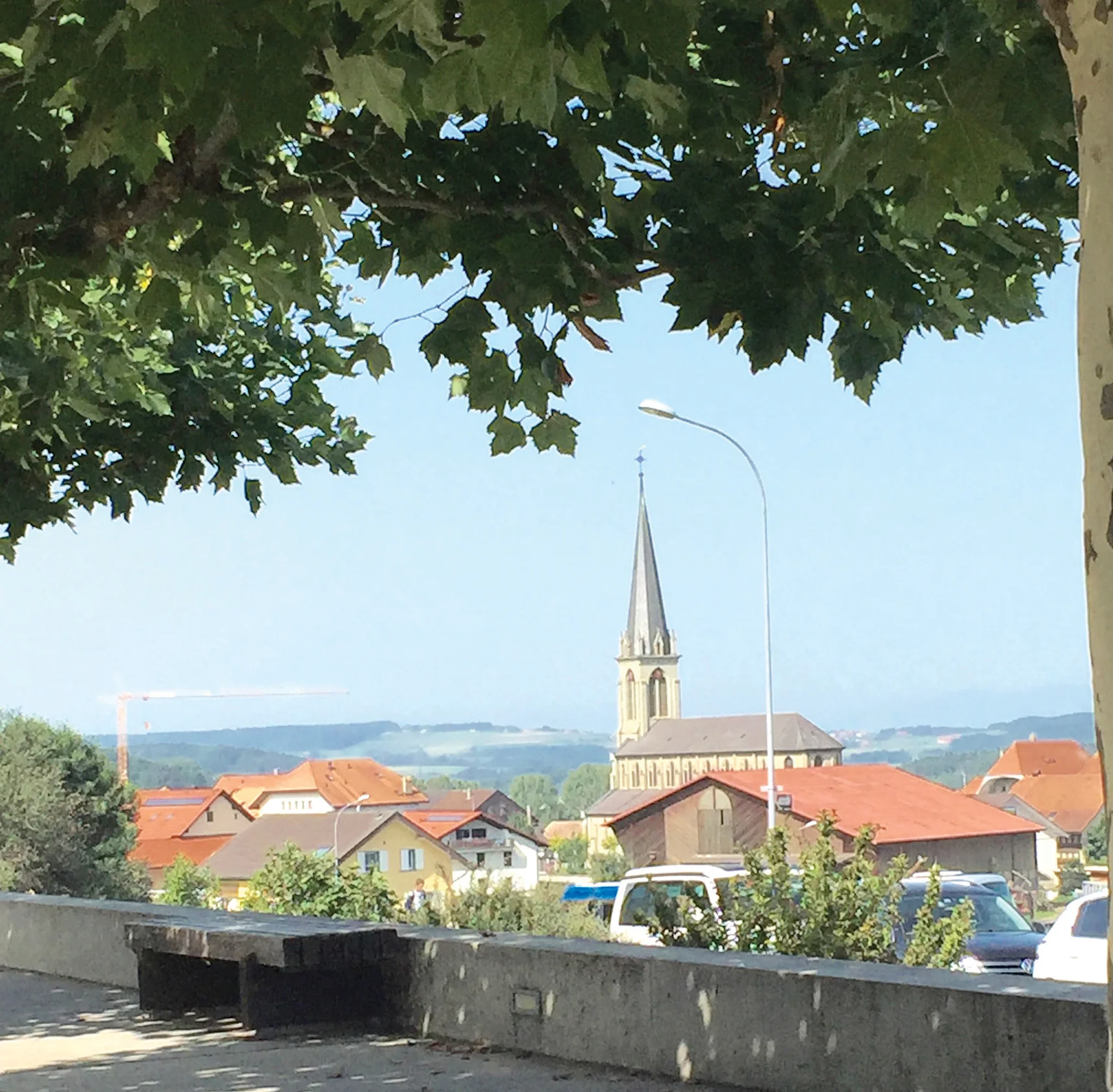 The church steeple of Farvagny le Grand stands out in this rural town, which has more in common with Stirling than simply cows.